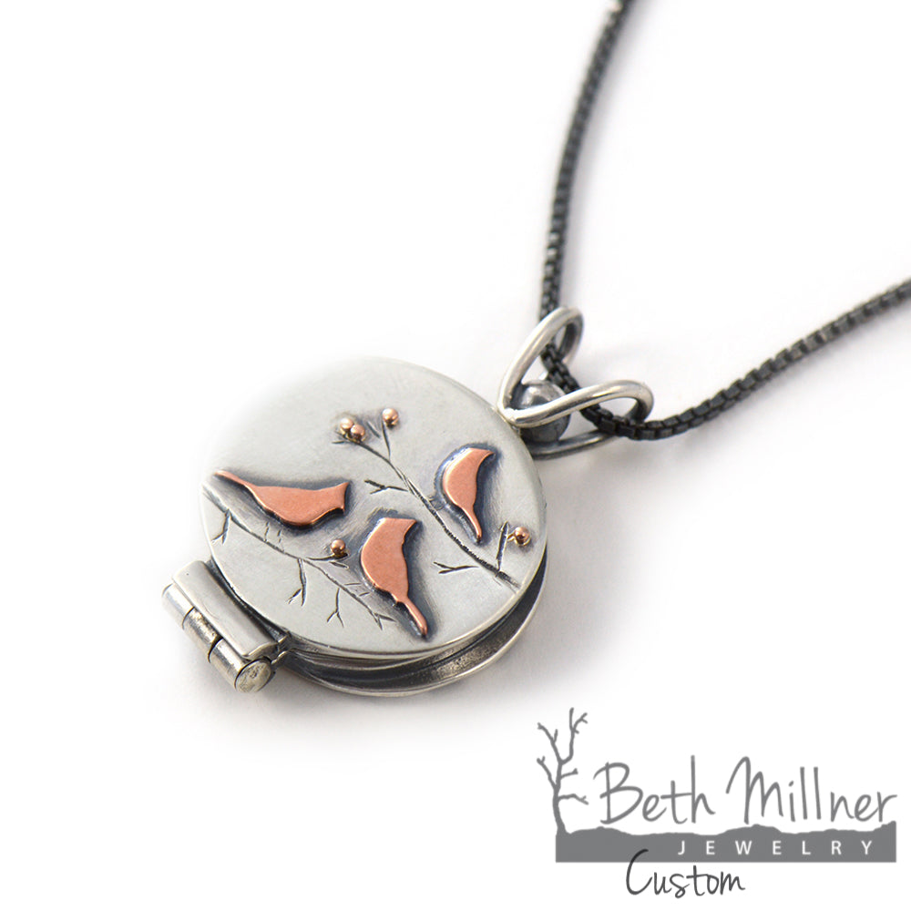 Custom Cardinal Locket in Recycled Sterling Silver and Copper Handmade at Beth Millner Jewelry in Marquette, Michigan