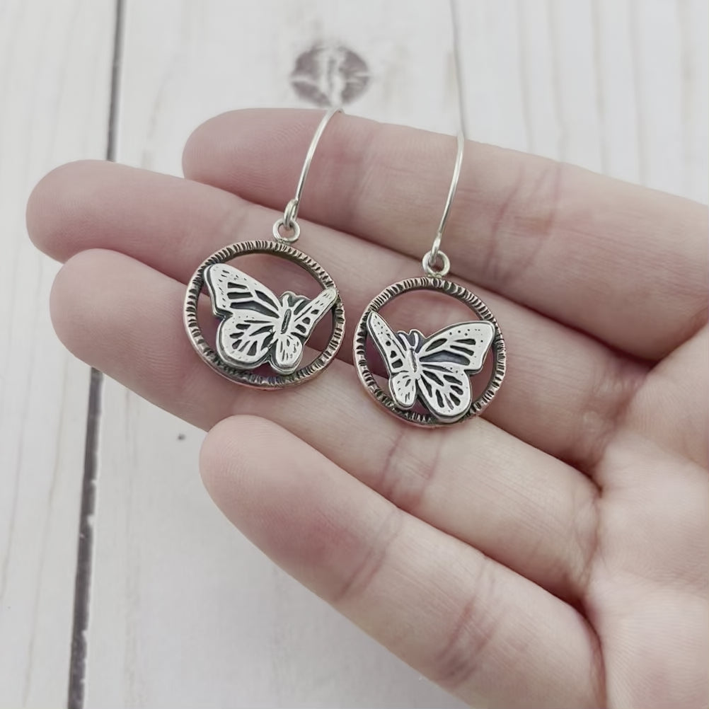 Sterling silver butterfly set in a copper hoop. By Beth Millner Jewelry.