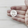 Sterling Silver pendant featuring hand sawn trees and an Upper Michigan Copper UP silhouette, silhouette 