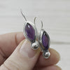 Handmade amethyst earrings set in sterling silver made by Beth Millner Jewelry. February Birthstone Earrings. 